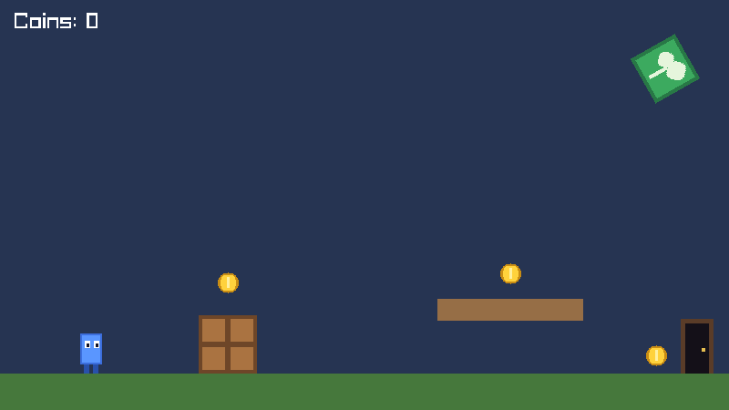 The editor's demo game: a blue character, coins, crates and a door on a green floor.